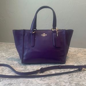 Purple handbag with removable shoulder/cross body strap